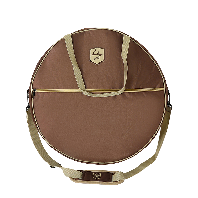 Lone Star Ropes timber brown circular rope bag with shoulder strap and front logo patch for rodeo gear storage